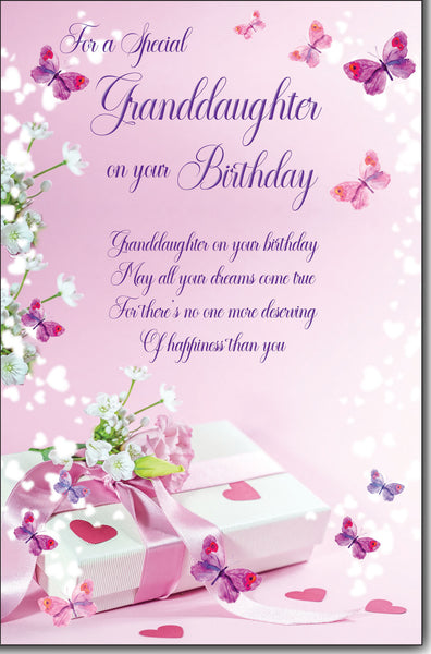 Pink birthday card for a granddaughter with purple cursive text, pink butterflies, white flowers, and a wrapped gift box at the bottom.
